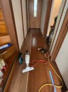 滋賀県草津市で玄関廊下のきしみでフローリングの上張り工事を実施